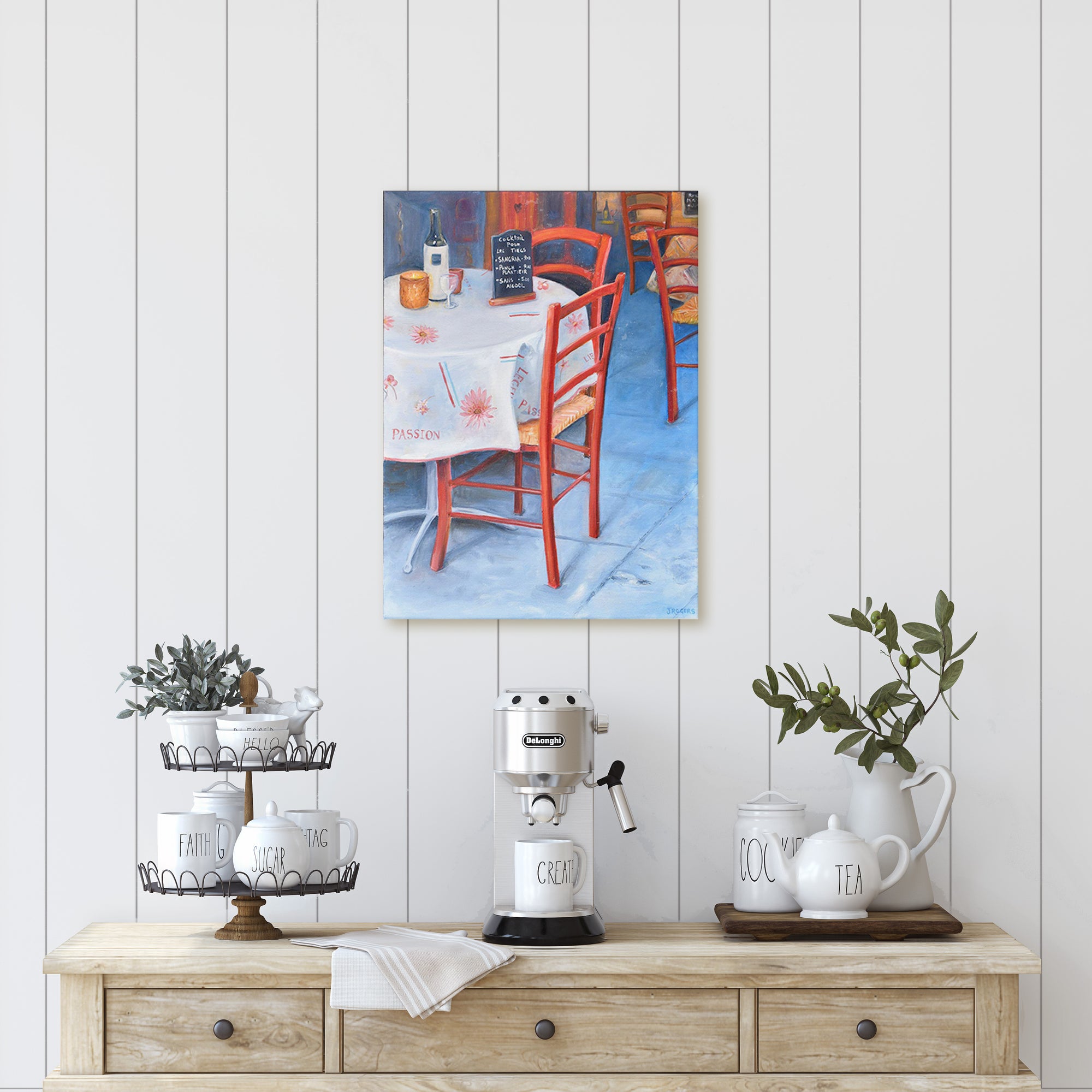 this is an oil painting of a restaurant in Nice, France with a blue floor and French red chairs displayed on a wall  by Australian artist Jenni Rogers