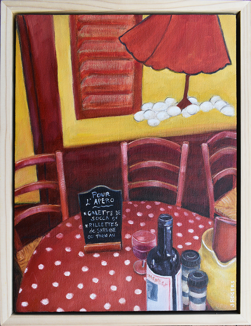 Red Tablethis is a painting with a polka dot red tablecloth and a bright yellow and red painting on a wall with a wine bottle from a restaurant in Nice, France by Australian Artist, Jenni Rogers